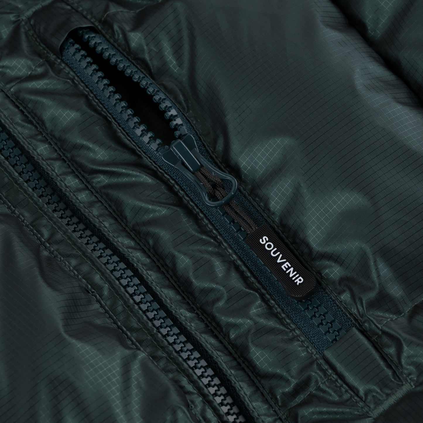 Mountain Puffy deep forest 400 fill synthetic down insulation ykk vislon zipper power skirt ykk zipper wolrd logo montreal souvenir cold temperature warm jacket winter snowboard snowboarding outerwear waterproof puffy vintage rideable puffy boarder street fashion ripstop