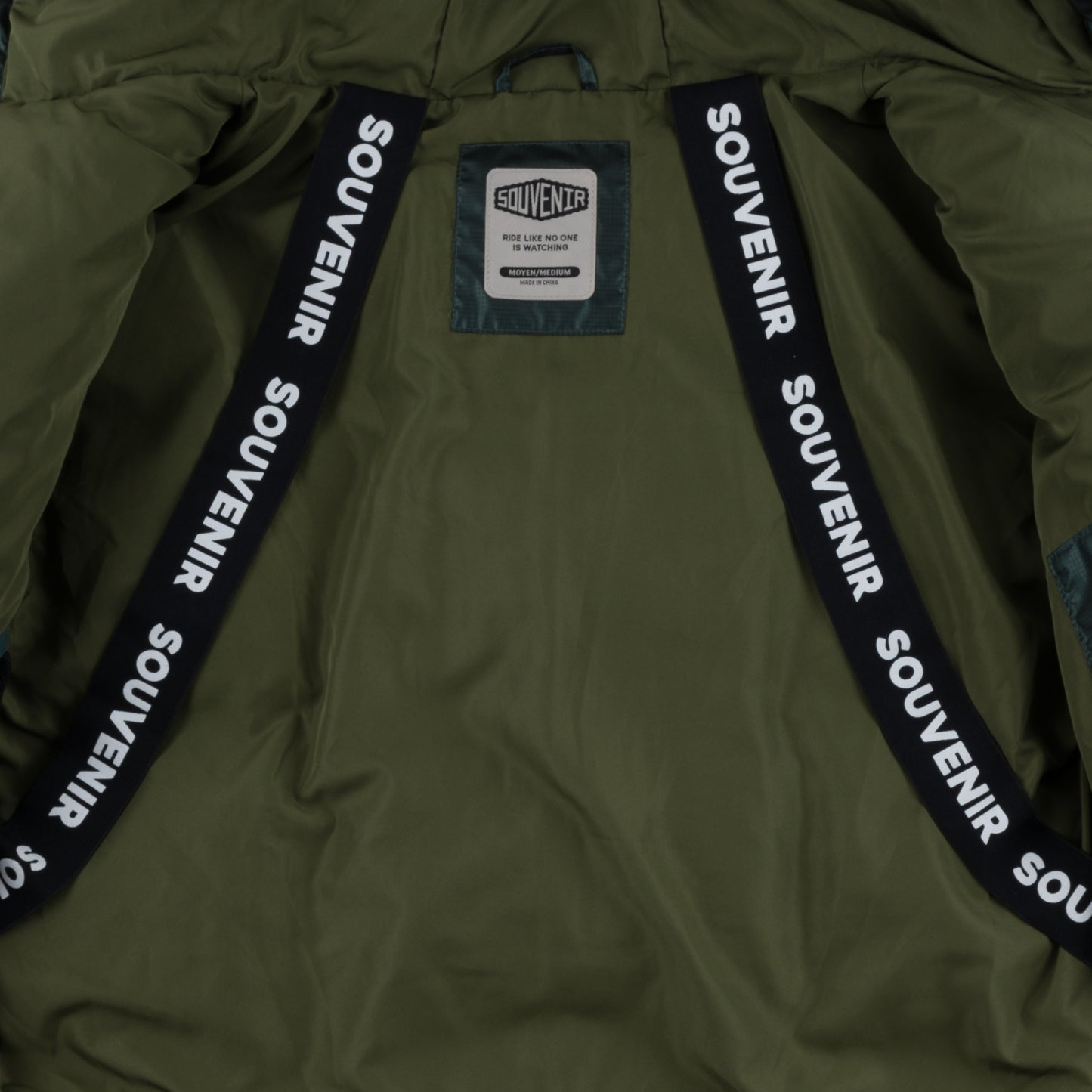 Mountain Puffy deep forest 400 fill synthetic down insulation ykk vislon zipper power skirt ykk zipper wolrd logo montreal souvenir cold temperature warm jacket winter snowboard snowboarding outerwear waterproof puffy vintage rideable puffy boarder street fashion ripstop