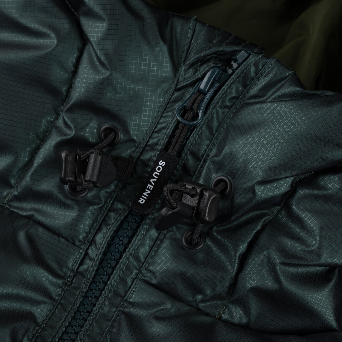 Mountain Puffy deep forest 400 fill synthetic down insulation ykk vislon zipper power skirt ykk zipper wolrd logo montreal souvenir cold temperature warm jacket winter snowboard snowboarding outerwear waterproof puffy vintage rideable puffy boarder street fashion ripstop