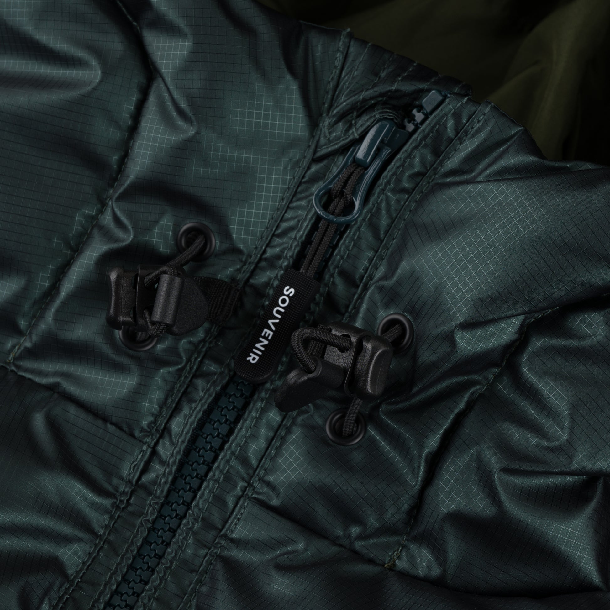 Mountain Puffy deep forest 400 fill synthetic down insulation ykk vislon zipper power skirt ykk zipper wolrd logo montreal souvenir cold temperature warm jacket winter snowboard snowboarding outerwear waterproof puffy vintage rideable puffy boarder street fashion ripstop