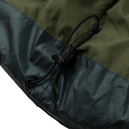 Mountain Puffy deep forest 400 fill synthetic down insulation ykk vislon zipper power skirt ykk zipper wolrd logo montreal souvenir cold temperature warm jacket winter snowboard snowboarding outerwear waterproof puffy vintage rideable puffy boarder street fashion ripstop 