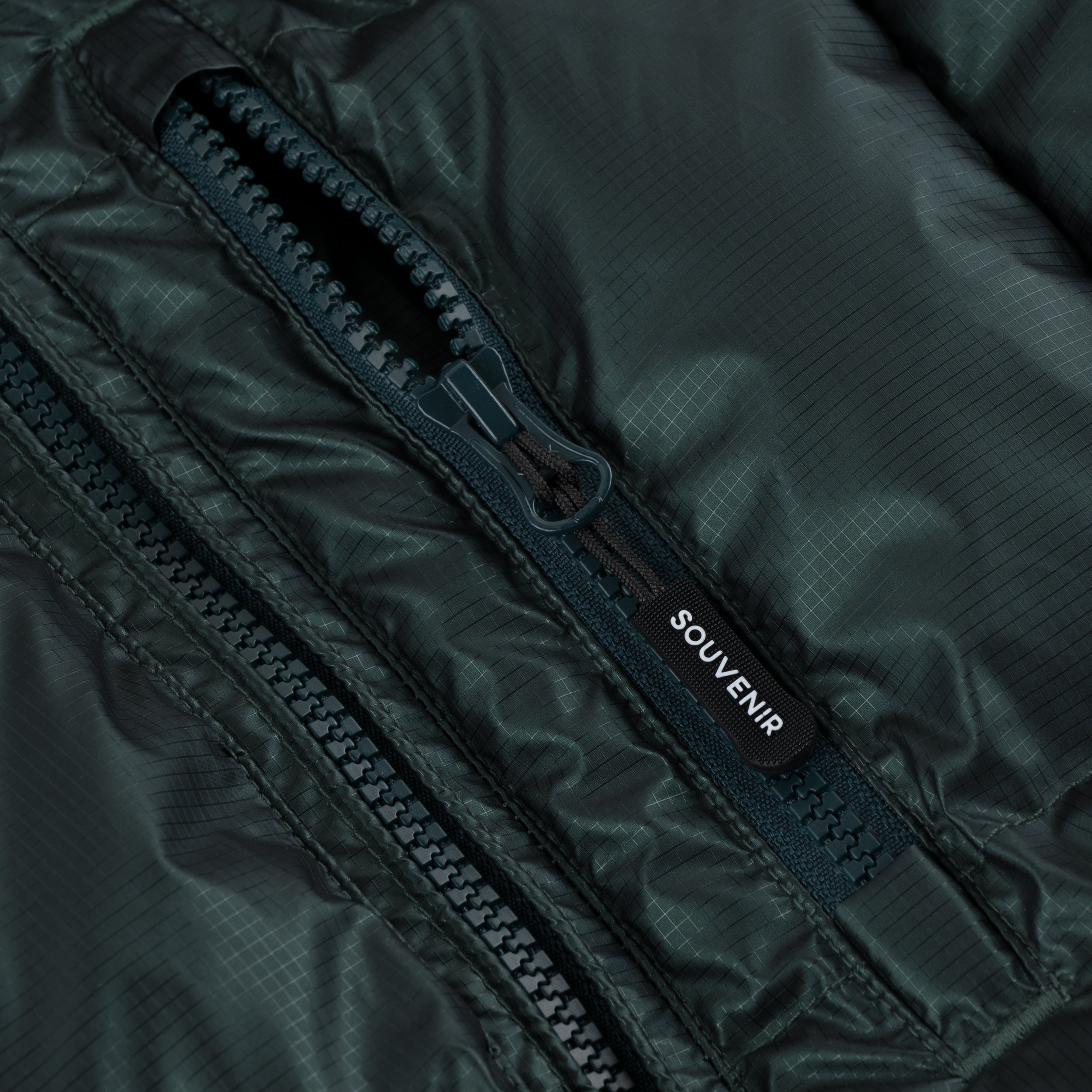 Mountain Puffy deep forest 400 fill synthetic down insulation ykk vislon zipper power skirt ykk zipper wolrd logo montreal souvenir cold temperature warm jacket winter snowboard snowboarding outerwear waterproof puffy vintage rideable puffy boarder street fashion ripstop 